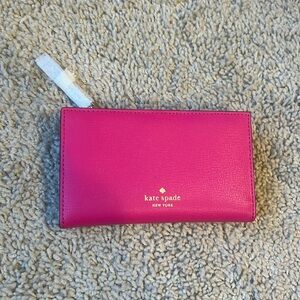 New without tags bright pink Kate Spade wallet